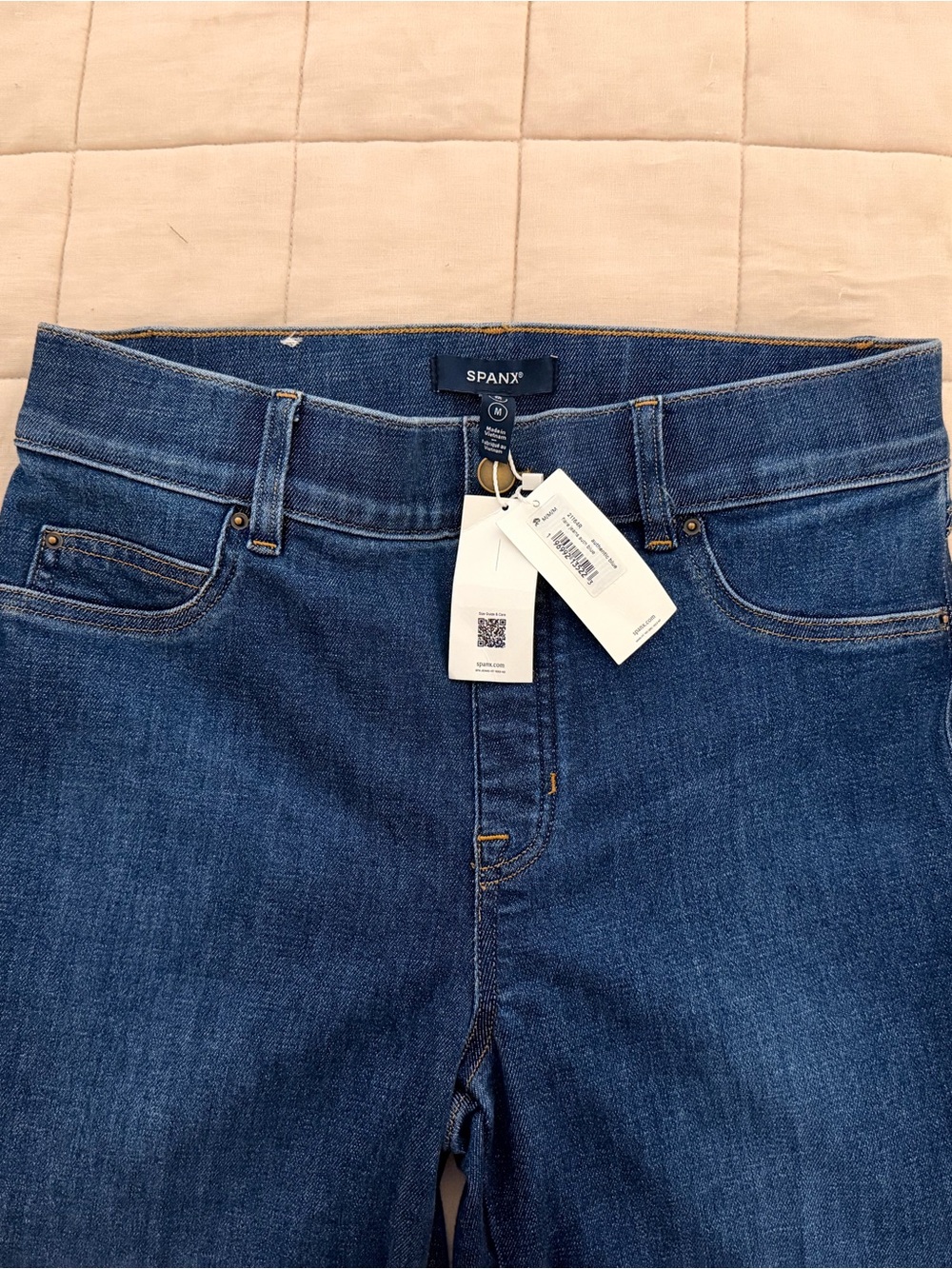 SPANX High-Rise Flare Jeans in Dark Blue Denim